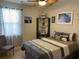 Relaxing bedroom with beach-themed decor, artwork, and soft natural light at 505 Heartland Ct., Murrells Inlet, SC 29576