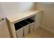 Laundry room features a folding counter and built-in hamper storage at 505 Heartland Ct., Murrells Inlet, SC 29576