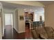 Open-concept living space showing the kitchen, pantry, and hallway, offering a sense of spaciousness at 505 Heartland Ct., Murrells Inlet, SC 29576