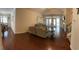 Spacious living room featuring hardwood floors, comfortable seating, fireplace, and access to the back patio at 505 Heartland Ct., Murrells Inlet, SC 29576