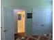 Bedroom view to the en suite bathroom and closet at 505 Heartland Ct., Murrells Inlet, SC 29576