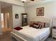 Bright main bedroom featuring a king bed, cabinet, and dresser with decor at 505 Heartland Ct., Murrells Inlet, SC 29576