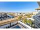 Aerial view of the property overlooking the waterway and showcasing the private pool and neighborhood at 5203 N Ocean Blvd. N, North Myrtle Beach, SC 29582