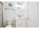 Charming bathroom featuring a modern vanity, decorative lighting, and clean design at 5203 N Ocean Blvd. N, North Myrtle Beach, SC 29582