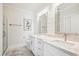 Bright bathroom featuring double sinks, stone countertops, and a modern design at 5203 N Ocean Blvd. N, North Myrtle Beach, SC 29582