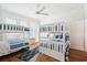 Bright bedroom featuring 2 sets of bunk beds, and a light, airy feel at 5203 N Ocean Blvd. N, North Myrtle Beach, SC 29582