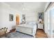 Beautiful bedroom featuring hardwood floors, coastal decor, and a light, airy feel at 5203 N Ocean Blvd. N, North Myrtle Beach, SC 29582