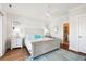Beautiful bedroom featuring hardwood floors, coastal decor, and a light, airy feel at 5203 N Ocean Blvd. N, North Myrtle Beach, SC 29582