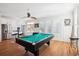 Game room featuring a pool table, bar stools, and a stainless steel fridge at 5203 N Ocean Blvd. N, North Myrtle Beach, SC 29582