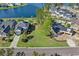 Expansive vacant lot with green grass and mature trees in a desirable waterfront community at 573 Starlit Way, Myrtle Beach, SC 29579