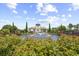 A gorgeous water feature greets you as you enter the community with lush landscaping and upscale design at 573 Starlit Way, Myrtle Beach, SC 29579
