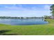 Picturesque water view, showcasing the tranquil lake and beautiful homes in the desirable waterfront community at 573 Starlit Way, Myrtle Beach, SC 29579