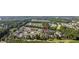Scenic aerial shot of condo community with a pool, lush landscaping, and convenient parking at 5882 Longwood Dr. # 201, Murrells Inlet, SC 29576