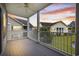 Outdoor balcony with a ceiling fan and views of the sunset at 5882 Longwood Dr. # 201, Murrells Inlet, SC 29576