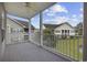 Outdoor balcony with a ceiling fan and views of the lawn at 5882 Longwood Dr. # 201, Murrells Inlet, SC 29576