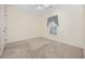 Bedroom features a window and neutral walls, carpeted floors, and a ceiling fan at 5882 Longwood Dr. # 201, Murrells Inlet, SC 29576