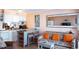 Open-concept living area with kitchen, comfortable seating and decorative wall art at 5905 S Kings Hwy. # 404 A, Myrtle Beach, SC 29575