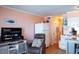 Inviting living room with comfortable seating, TV, and access to kitchen at 5905 S Kings Hwy. # 404 A, Myrtle Beach, SC 29575