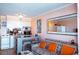 Living area showcasing seating, tile flooring, and cozy breakfast bar in the kitchen at 5905 S Kings Hwy. # 404 A, Myrtle Beach, SC 29575