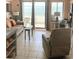 Bright living room with ocean views and comfortable seating area at 5905 S Kings Hwy. # 404 A, Myrtle Beach, SC 29575