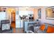 Open-concept living area with kitchen, comfortable seating and tile flooring at 5905 S Kings Hwy. # 404 A, Myrtle Beach, SC 29575