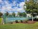 Well-maintained tennis courts surrounded by lush landscaping at 5905 S Kings Hwy. # 404 A, Myrtle Beach, SC 29575