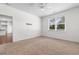 A bedroom with carpet floors and large window for natural light at 591 Meadowgrass Ct., Myrtle Beach, SC 29588