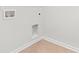 Clean laundry room area with tile floor, new connections and ample outlets at 591 Meadowgrass Ct., Myrtle Beach, SC 29588