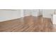 A spacious living room features hardwood floors and lots of natural light at 591 Meadowgrass Ct., Myrtle Beach, SC 29588
