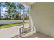 Cozy screened porch featuring a pet door, view of the backyard, and natural light at 591 Meadowgrass Ct., Myrtle Beach, SC 29588