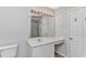 Bathroom featuring vanity with mirror and sink, toilet, and shower at 6000 Isabel Ct., Myrtle Beach, SC 29579