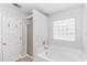 Bright bathroom with a soaking tub and tiled shower at 6000 Isabel Ct., Myrtle Beach, SC 29579