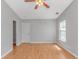 Large bedroom features hardwood floors, closet and natural light from windows at 6000 Isabel Ct., Myrtle Beach, SC 29579