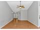 Spacious living room with hardwood floors, a ceiling fan, and ample natural light at 6000 Isabel Ct., Myrtle Beach, SC 29579