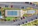 Aerial view of community tennis courts, manicured landscaping, parking, and surrounding area at 608 Waterway Village Blvd. # 27-F, Myrtle Beach, SC 29579