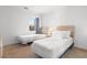 Sunlit bedroom features twin beds, a neutral color scheme, and a cozy ambiance at 608 Waterway Village Blvd. # 27-F, Myrtle Beach, SC 29579