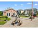 Community clubhouse with picnic tables, grill, and parking in a park-like setting at 608 Waterway Village Blvd. # 27-F, Myrtle Beach, SC 29579
