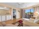 Inviting living area features a built-in cabinet, comfortable seating, and access to a scenic balcony at 608 Waterway Village Blvd. # 27-F, Myrtle Beach, SC 29579