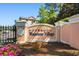 Entrance to Waterway Village with lush landscaping and community signage at 608 Waterway Village Blvd. # 27-F, Myrtle Beach, SC 29579