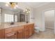 Elegant bathroom with dual sinks, granite countertops, and a walk-in shower at 610 Cocas Dr., Myrtle Beach, SC 29579