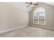 Cozy bedroom featuring a large window with natural light and plush carpeting at 610 Cocas Dr., Myrtle Beach, SC 29579