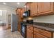 Stylish kitchen showcasing granite countertops, stainless steel appliances, and wooden cabinets at 610 Cocas Dr., Myrtle Beach, SC 29579