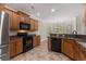 Well-designed kitchen with stainless steel appliances and a view of the breakfast nook at 610 Cocas Dr., Myrtle Beach, SC 29579