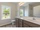 Bathroom featuring a double vanity, large mirror, and a window with a scenic view at 625 Woodside Dr., Conway, SC 29526