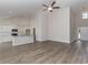 Open-concept living room with modern flooring and plenty of natural light at 625 Woodside Dr., Conway, SC 29526