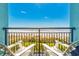 Enjoy ocean views from the balcony with two white Adirondack chairs and beach views at 6804 N Ocean Blvd. # 523, Myrtle Beach, SC 29572