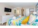 Comfortable bedroom featuring a TV, dresser, and closet for ample storage at 6804 N Ocean Blvd. # 523, Myrtle Beach, SC 29572