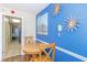 Comfortable condo dining area with table and view of kitchen at 6804 N Ocean Blvd. # 523, Myrtle Beach, SC 29572