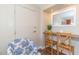 Cozy sitting area features a floral chair and small desk with a mirror for added convenience at 6804 N Ocean Blvd. # 523, Myrtle Beach, SC 29572
