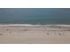 Wide aerial view of beautiful beach and coastline, people relaxing on the sand at 6900 N Ocean Blvd. # 1034, Myrtle Beach, SC 29579